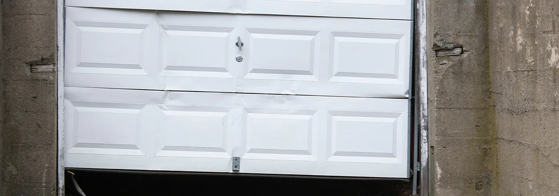 Garage Door Got Hit By A Car Dent Removal in Waukegan, IL