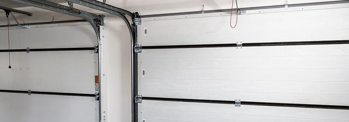 Fix Folding Garage Door Jerking in Waukegan, Illinois