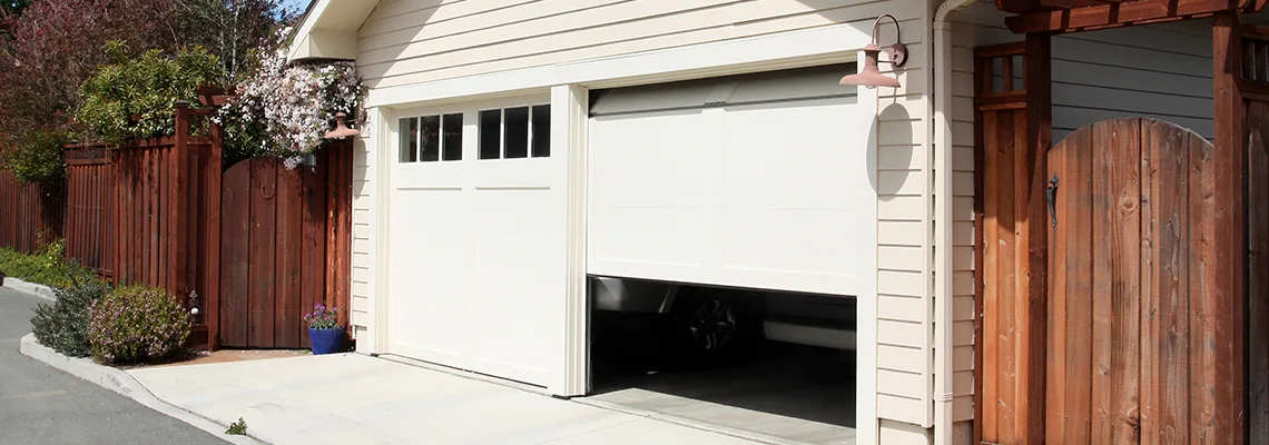 Fix Metal Garage Door Jerking in Waukegan, Illinois